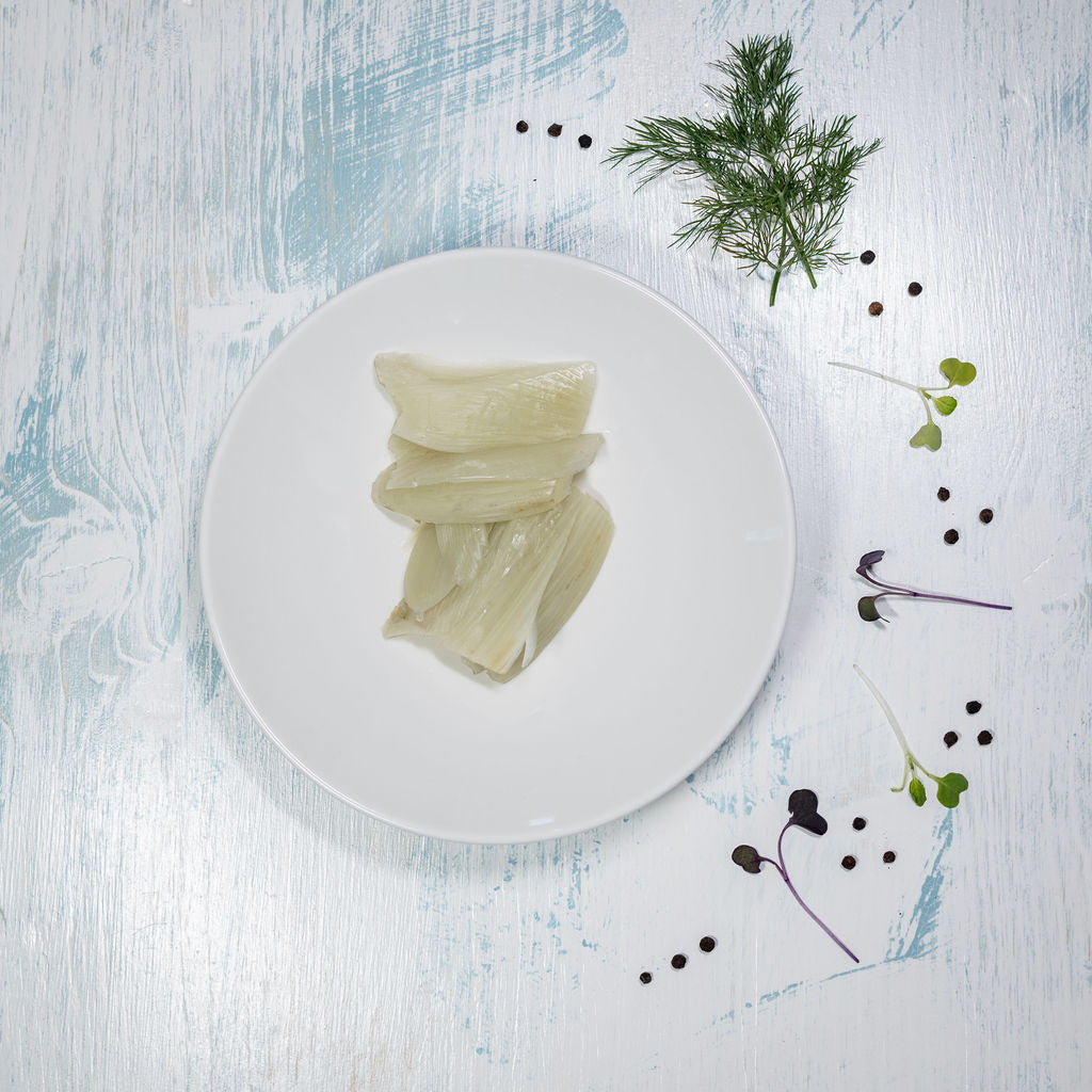 Fenchel mit Butter angerichtet auf einem hellen Teller