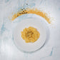 Polenta-Bramata auf Teller angerichtet 