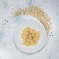 Gnocchi mit Butter angerichtet auf einem weissen Teller